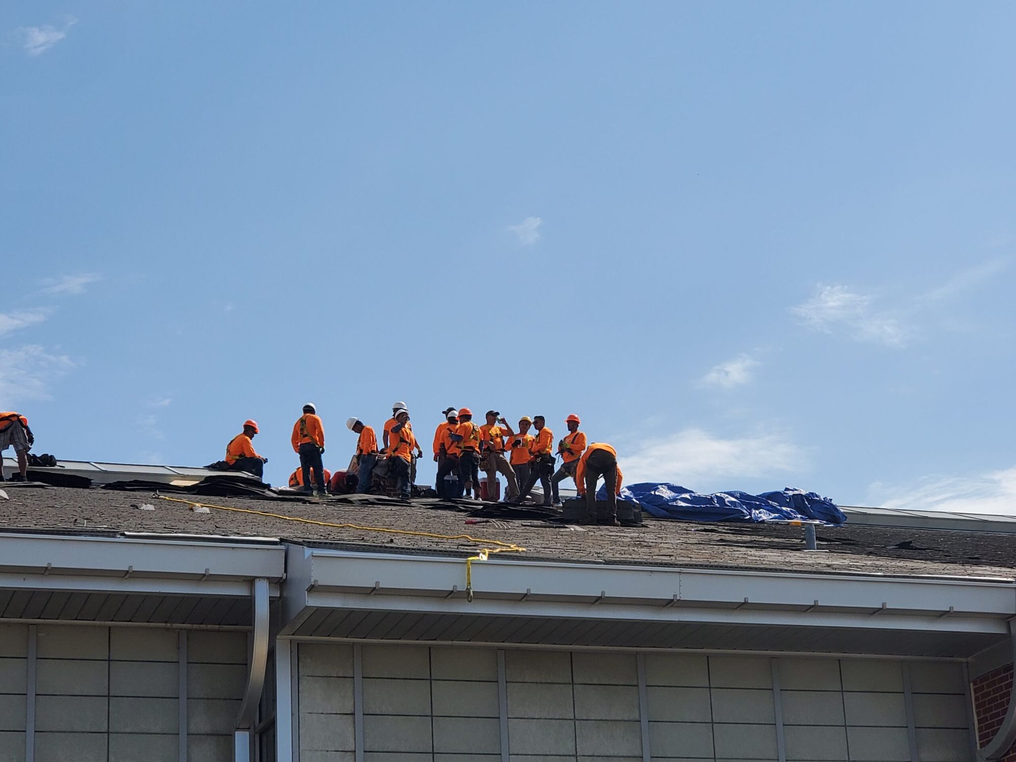 Revolve Construction crews on a St. Louis roof replacement